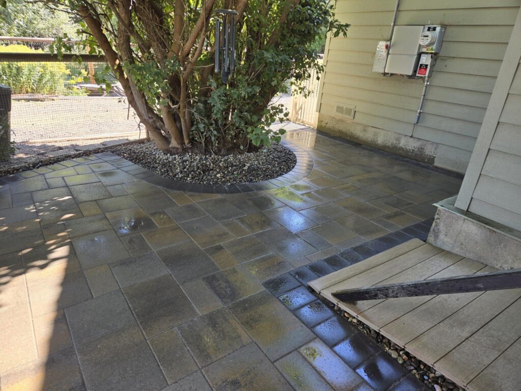 Pavers and concrete choices for driveways by Loewen Greenhouses & Landscaping, showcasing durability and aesthetic appeal.