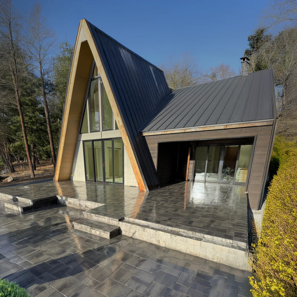 Pavers vs. concrete for driveways and patios, showcasing landscaping options by Loewen Greenhouses & Landscaping.